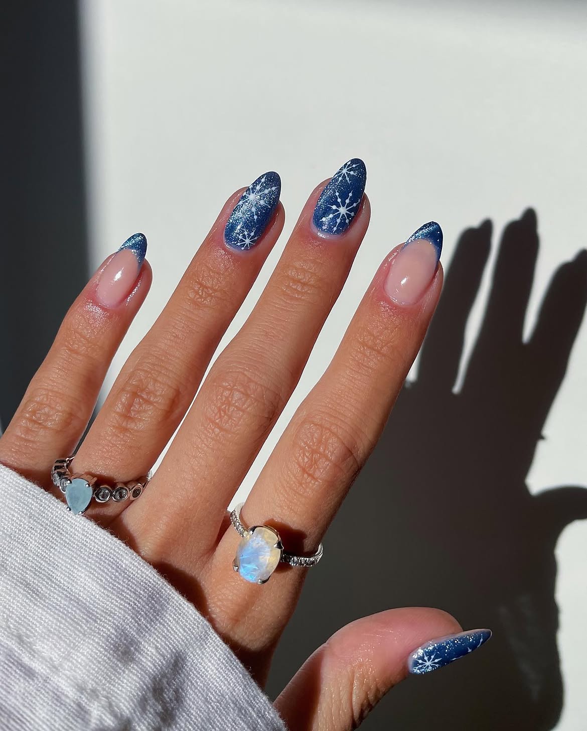 Sparkling Navy Blue Snowflake Almond French Nails