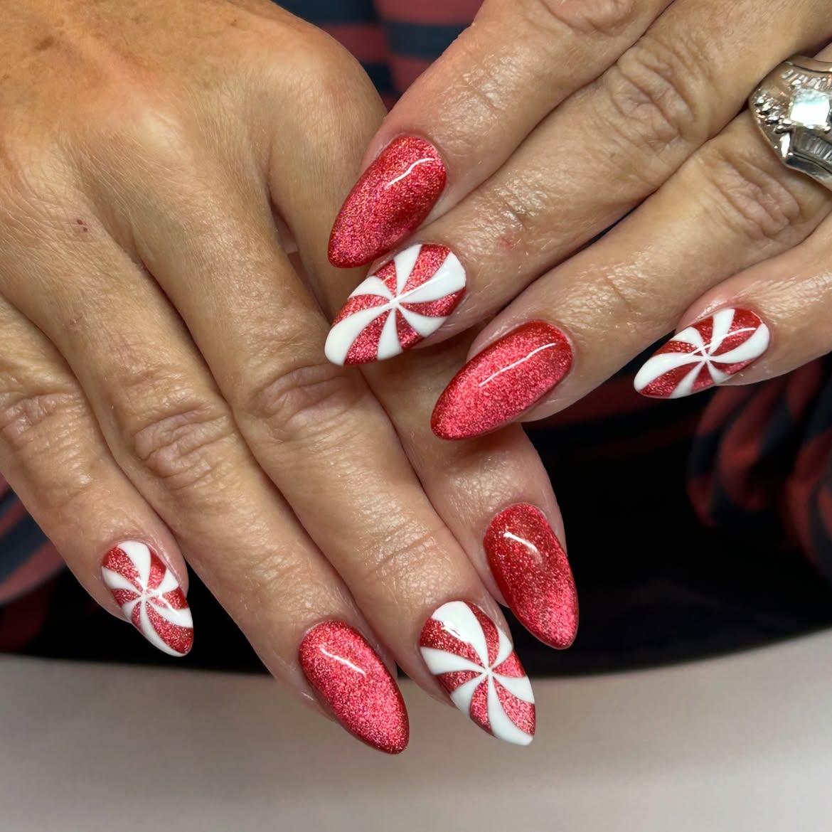 Sparkling Red and White Peppermint Swirl Almond Nails