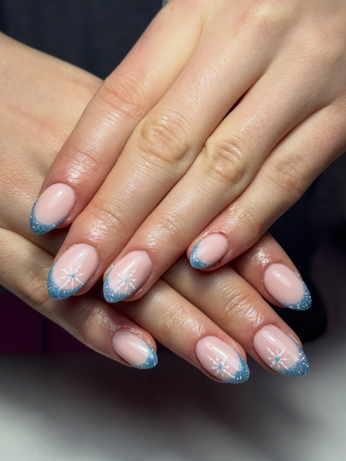 Sparkling Snowflake French Tip Almond Nails