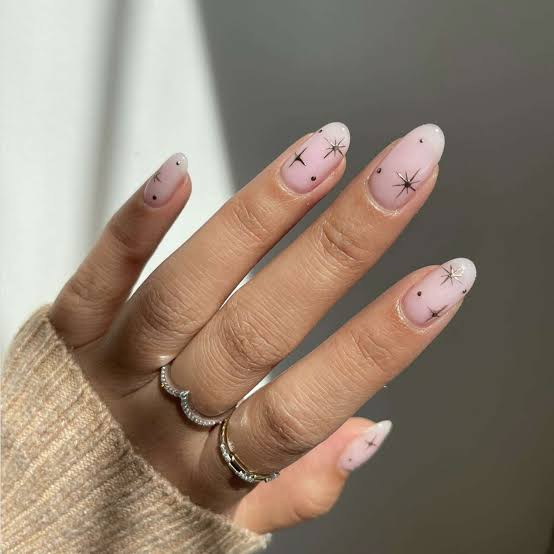 Medium Oval Milky Pink with Black Star Line Art Medium Oval Milky Pink with Black Star Line Art — Star Nails