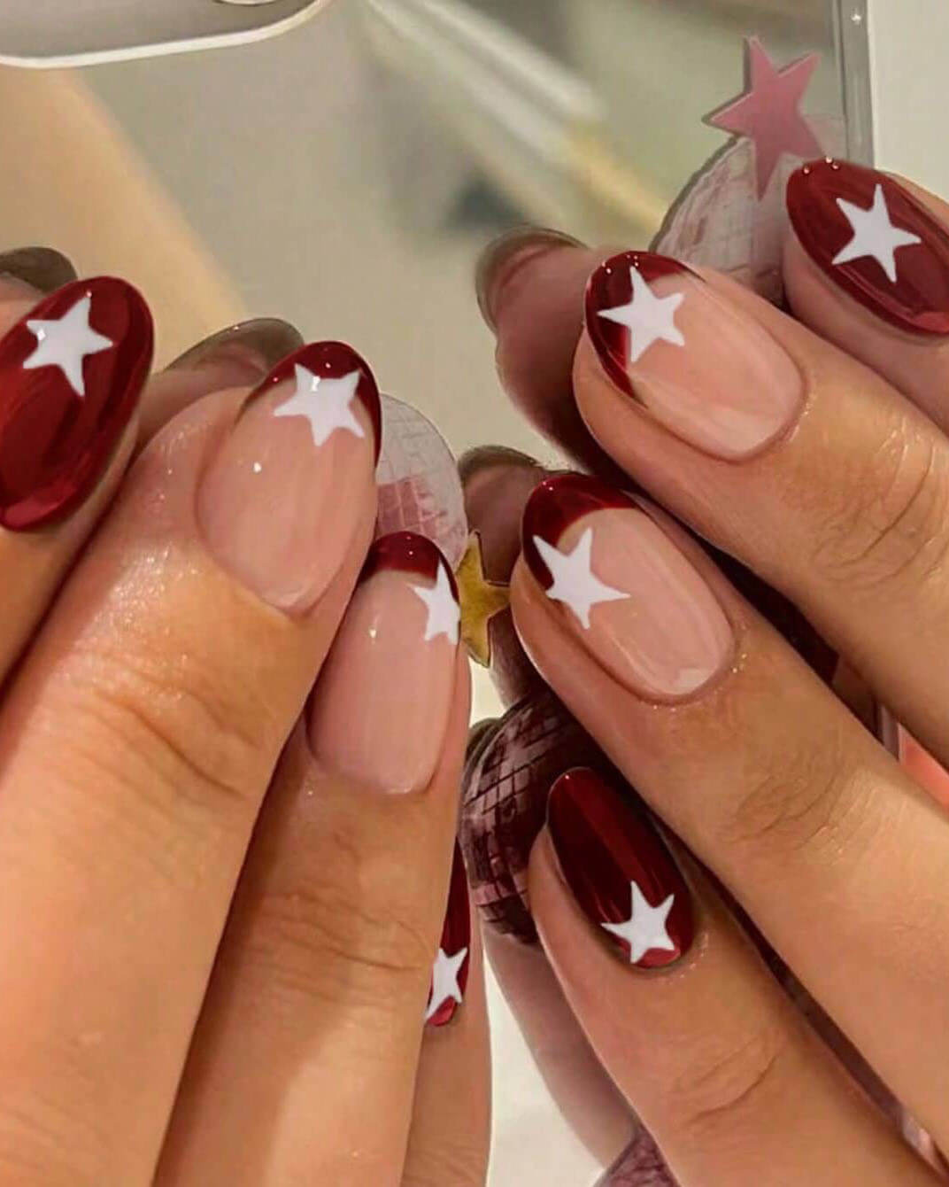 Short Oval Nude Deep Red French with White Stars Short Oval Nude Deep Red French with White Stars — Star Nails