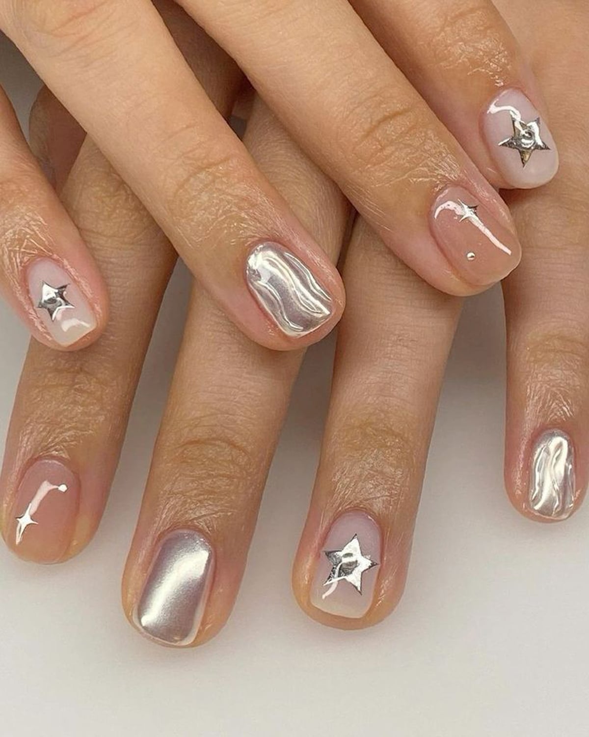 Long Almond Gold Foil Sunburst and Star Nails Long Almond Gold Foil Sunburst and Star Nails