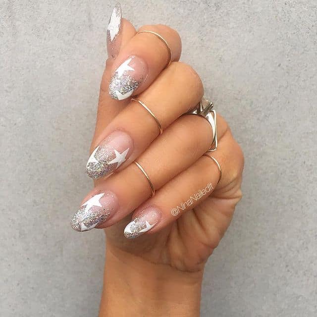 Long Sharp Nude with White Stars and Silver Glitter Long Sharp Nude with White Stars and Silver Glitter — Star Nails