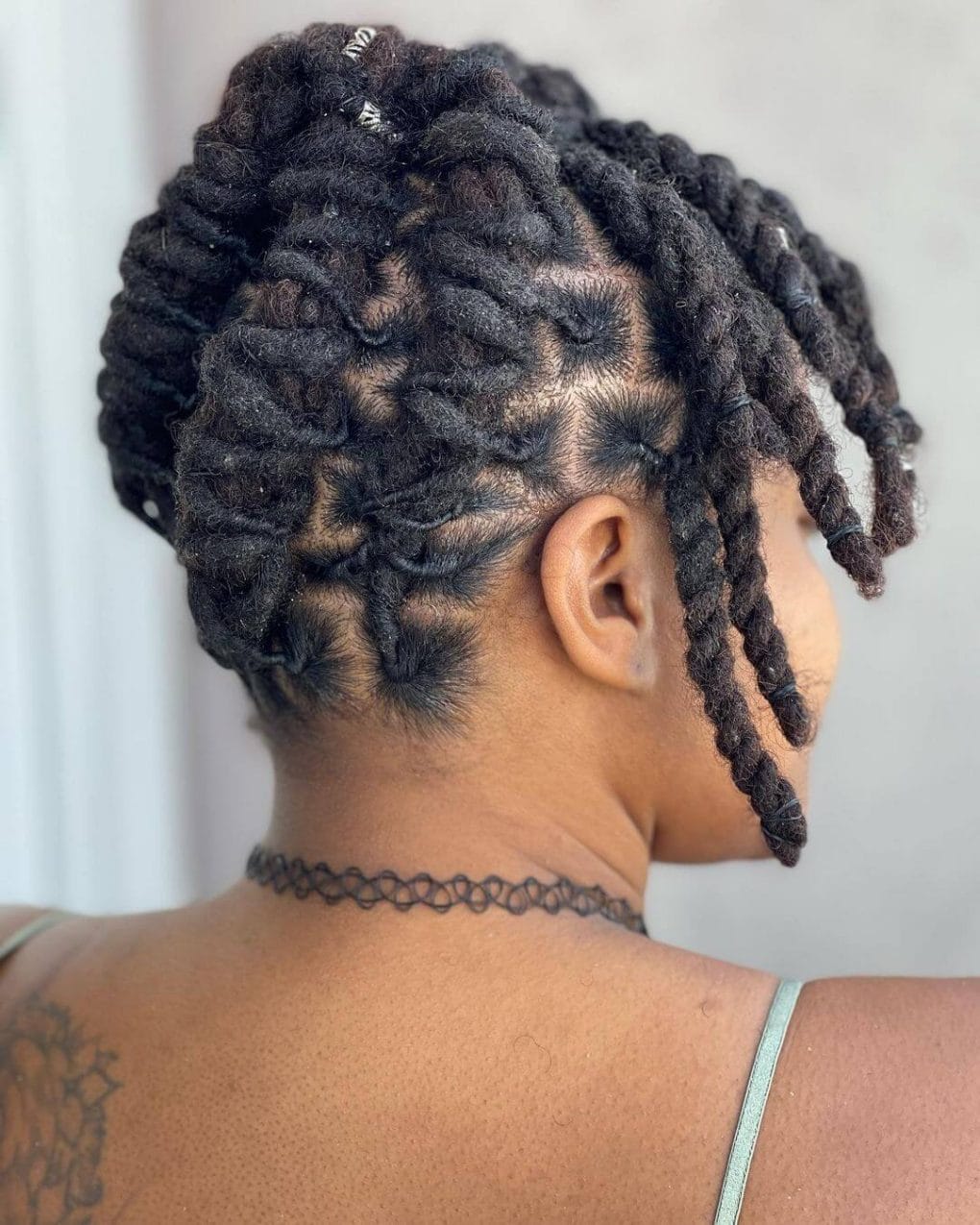 Starter Locs Styled into an Elegant Bun Starter Locs Styled into an Elegant Bun
