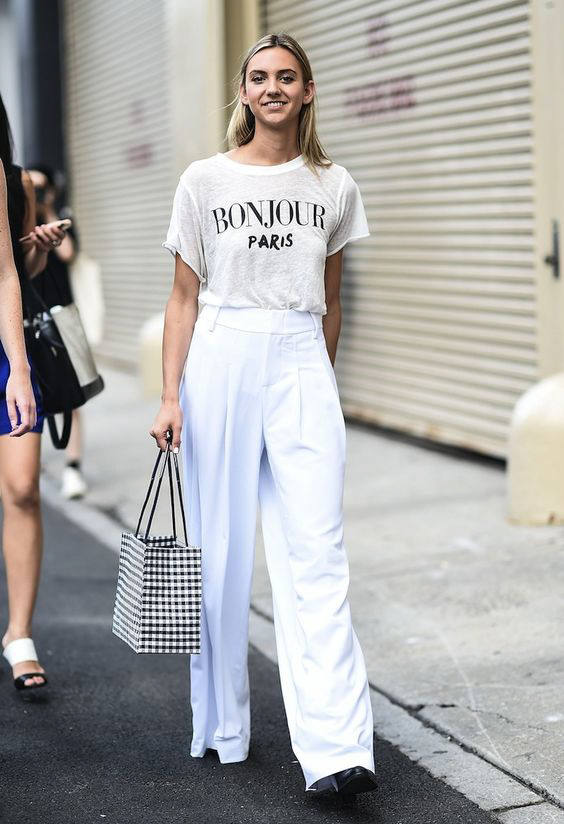Graphic t-shirt with wide-leg white trousers Graphic t-shirt with wide-leg white trousers — Street Style Outfits