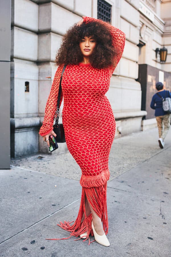 Vibrant red crochet knit dress with fringe hem Vibrant red crochet knit dress with fringe hem — Street Style Outfits