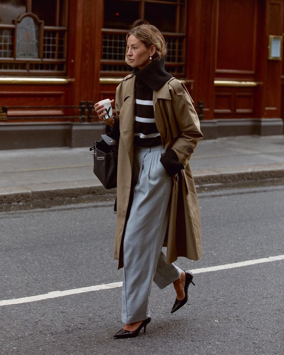 Striped turtleneck sweater layered under a beige trench coat Striped turtleneck sweater layered under a beige trench coat — Sweater Outfits for Women