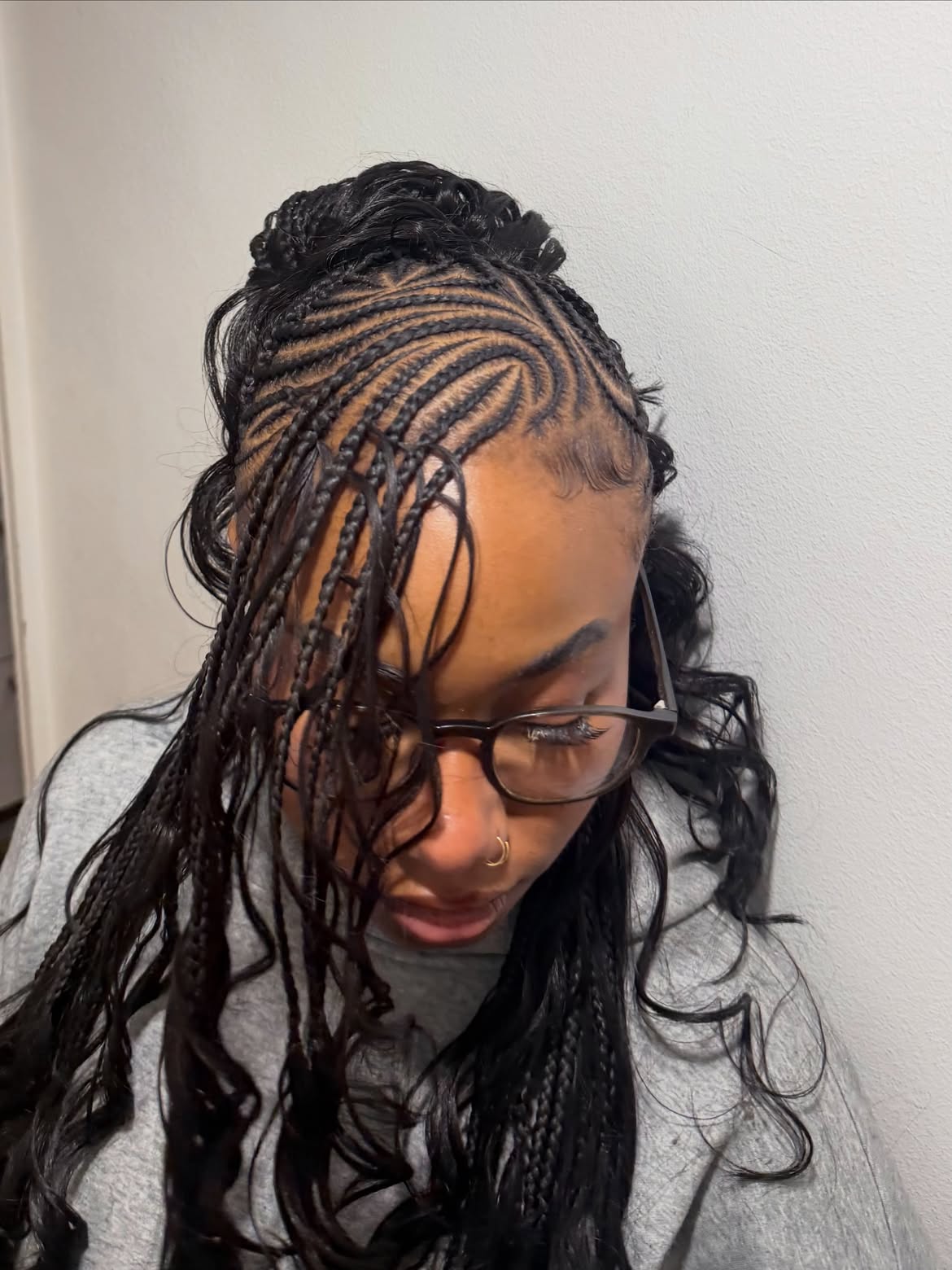 Swirl Cornrows With Loose Braided Tendrils
