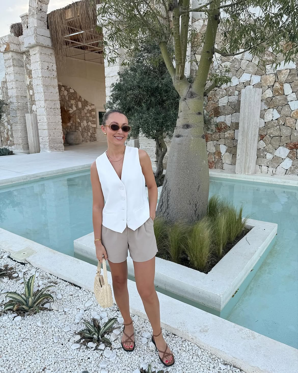 Tailored White Vest And Neutral Short Resort Look