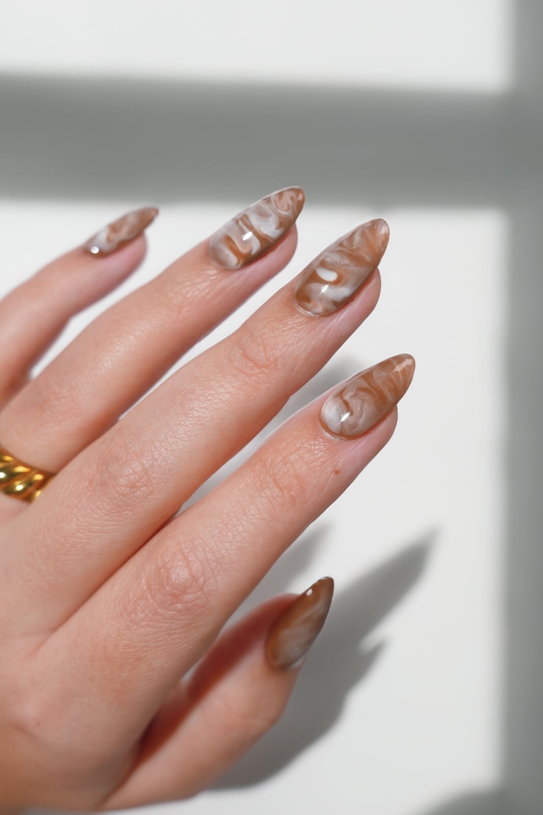 Milky Brown and White Marble Stiletto Nails Milky Brown and White Marble Stiletto Nails — Tan Nails