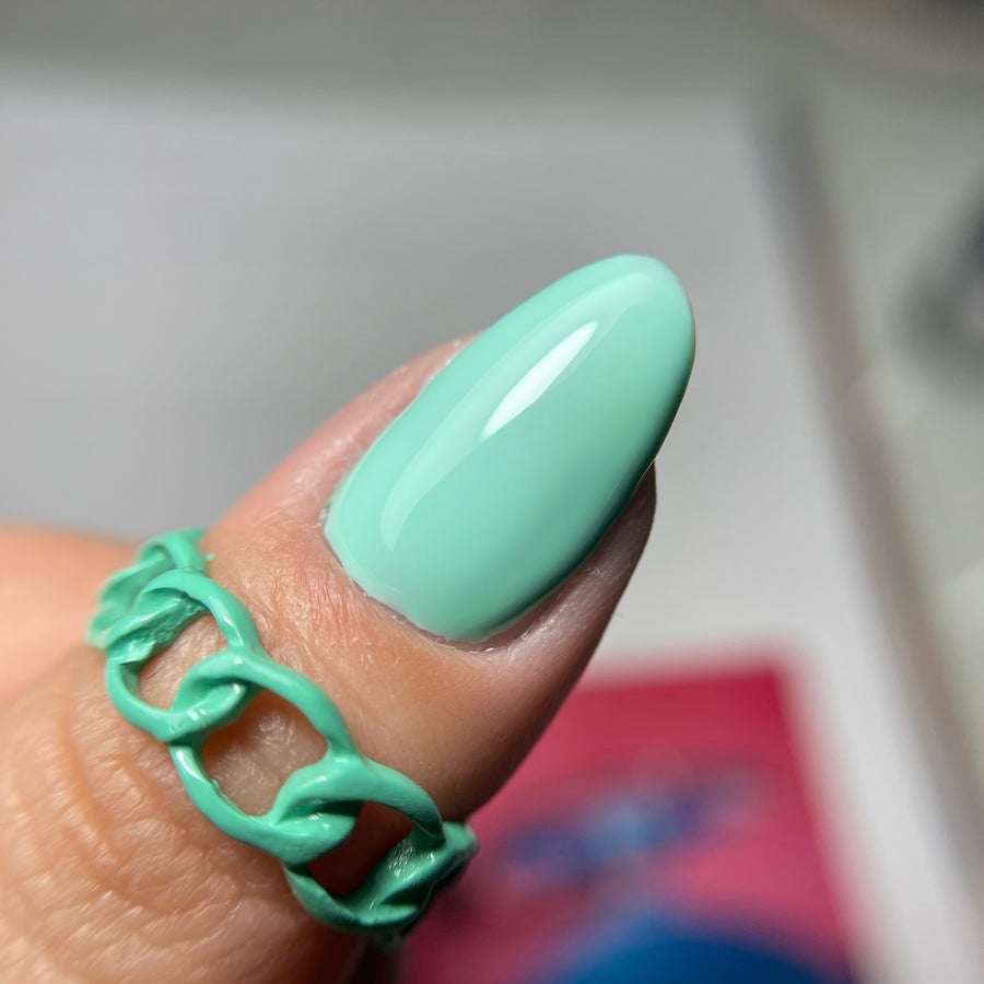 Vibrant Neon Glossy Medium Oval Teal Nails Vibrant Neon Glossy Medium Oval Teal Nails