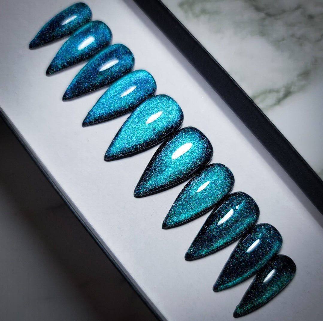 Glossy Cat Eye Medium-Long Almond Teal Nails, Full Nail Coverage Glossy Cat Eye Medium-Long Almond Teal Nails, Full Nail Coverage