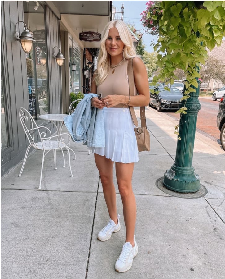 Denim Jacket Over Beige Top With White Tennis Skirt Denim Jacket Over Beige Top With White Tennis Skirt — Tennis Skirt Outfits