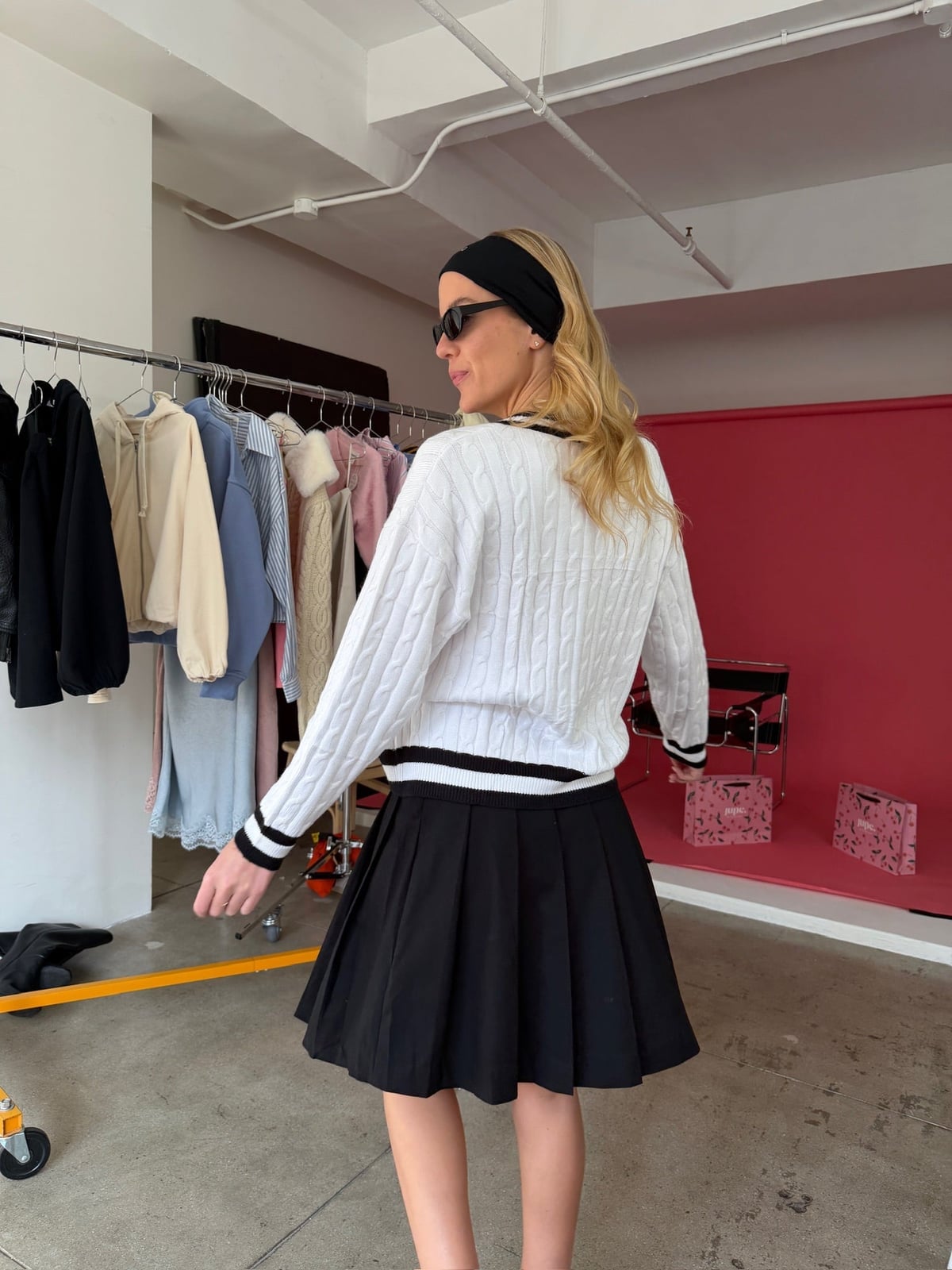 Cable Knit Sweater With Black Pleated Tennis Skirt, Close-Up Take Cable Knit Sweater With Black Pleated Tennis Skirt, Close-Up Take — Tennis Skirt Outfits