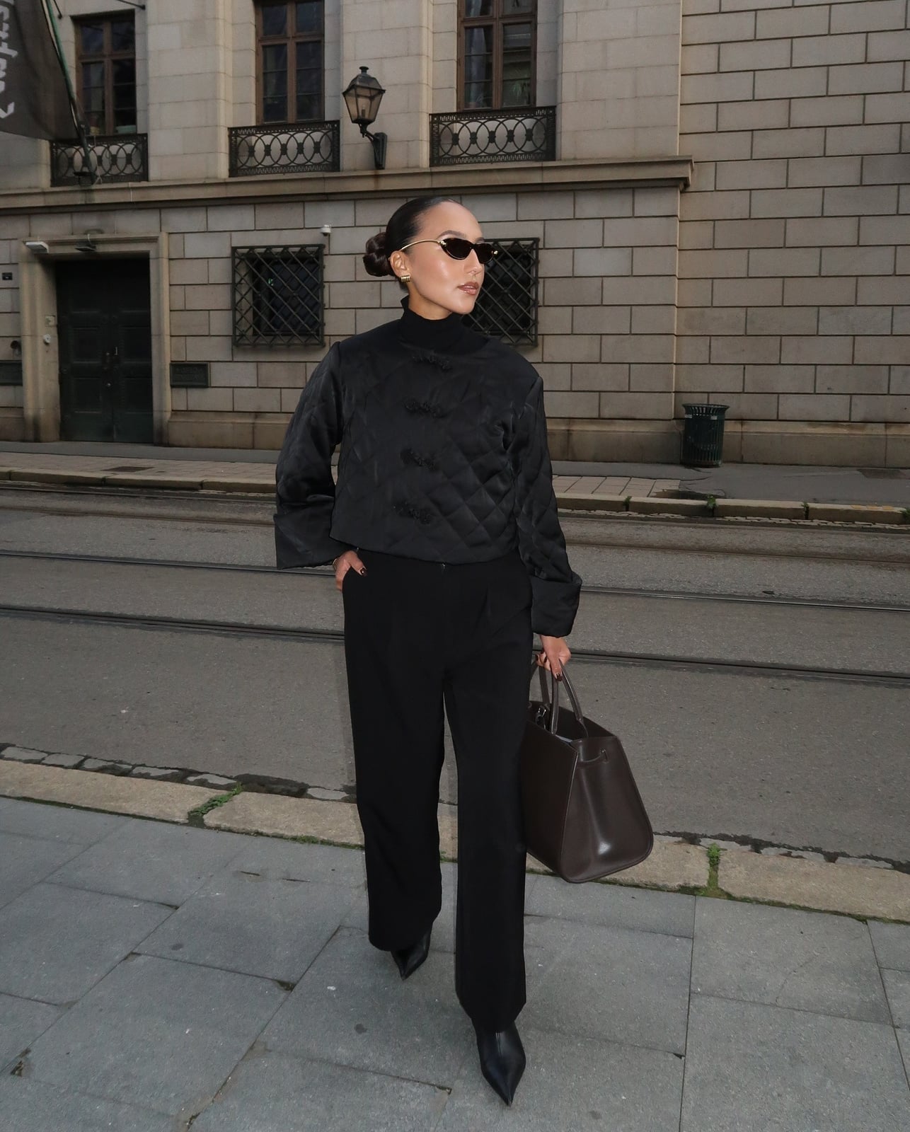 A quilted jacket adds texture to black wide-leg trousers A quilted jacket adds texture to black wide-leg trousers — Trouser Outfits