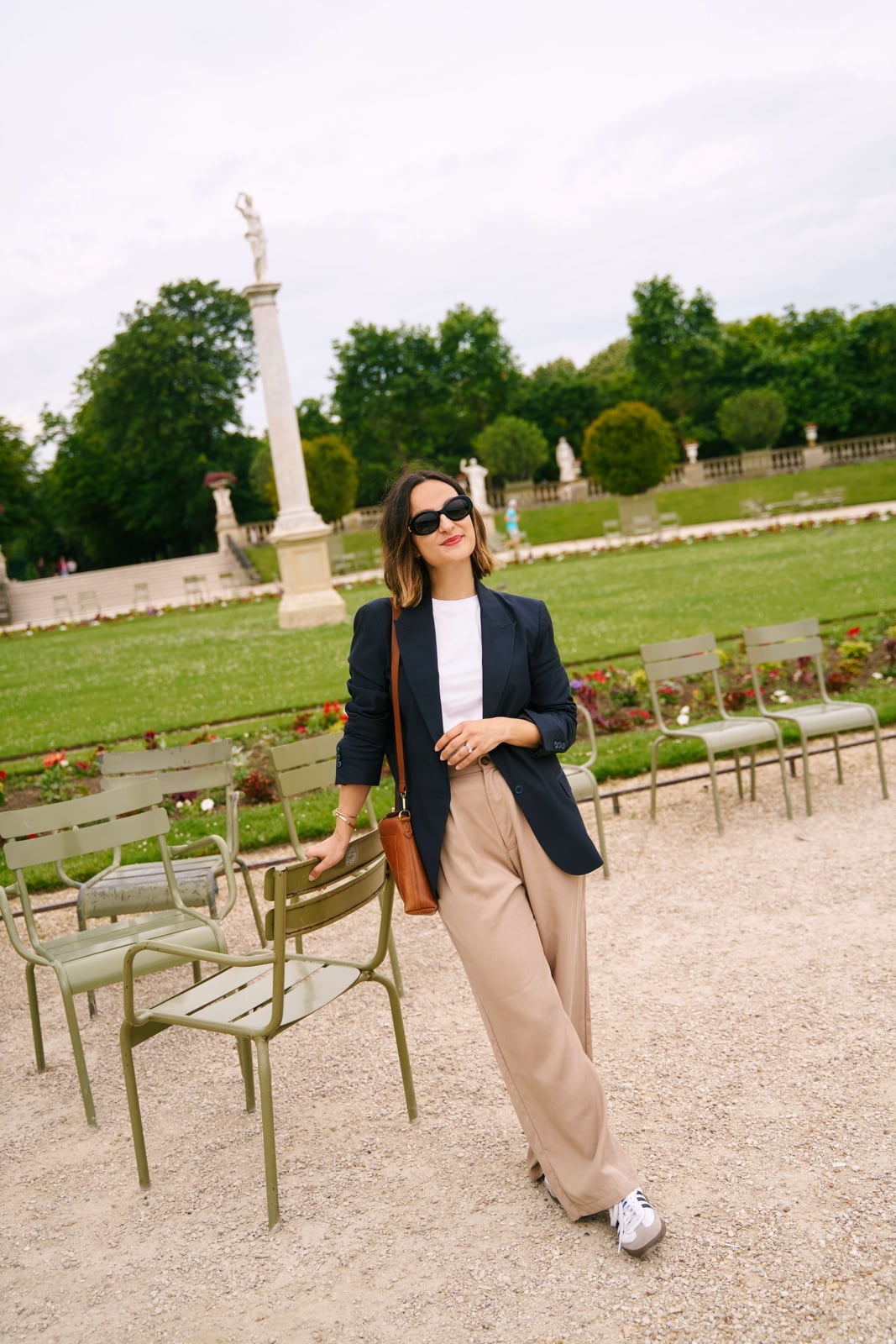 Oversized navy blazer over beige trousers offers smart casual Oversized navy blazer over beige trousers offers smart casual — Trouser Outfits