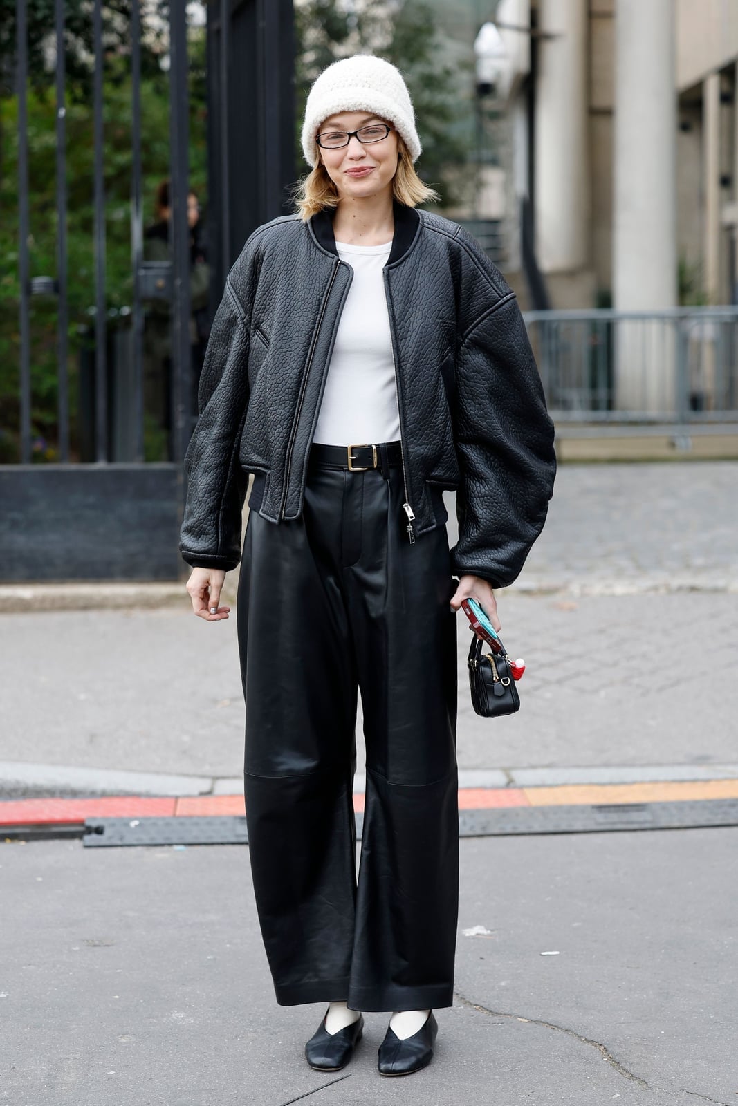 Leather trousers add edgy texture to a monochrome look Leather trousers add edgy texture to a monochrome look — Trouser Outfits