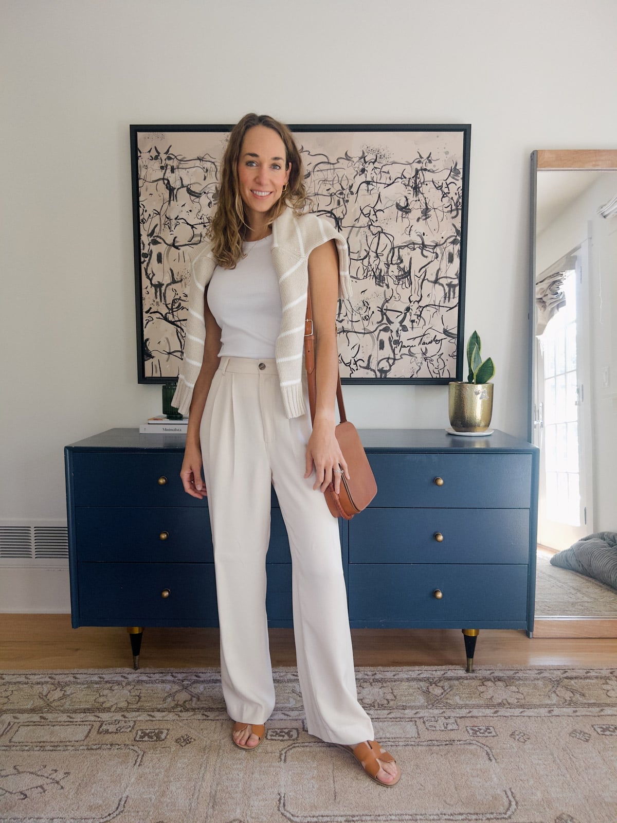 Cream wide-leg trousers lend a soft, neutral base Cream wide-leg trousers lend a soft, neutral base — Trouser Outfits
