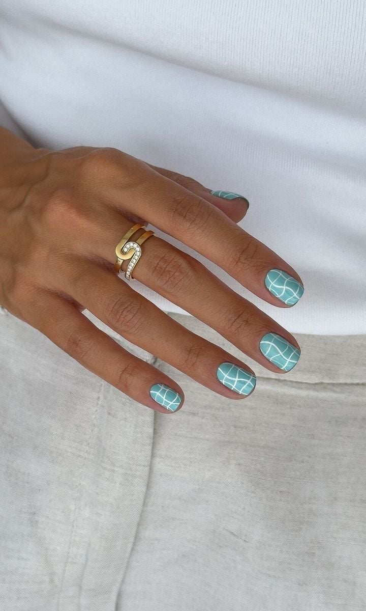 Turquoise Nails with White Grid Pattern Turquoise Nails with White Grid Pattern