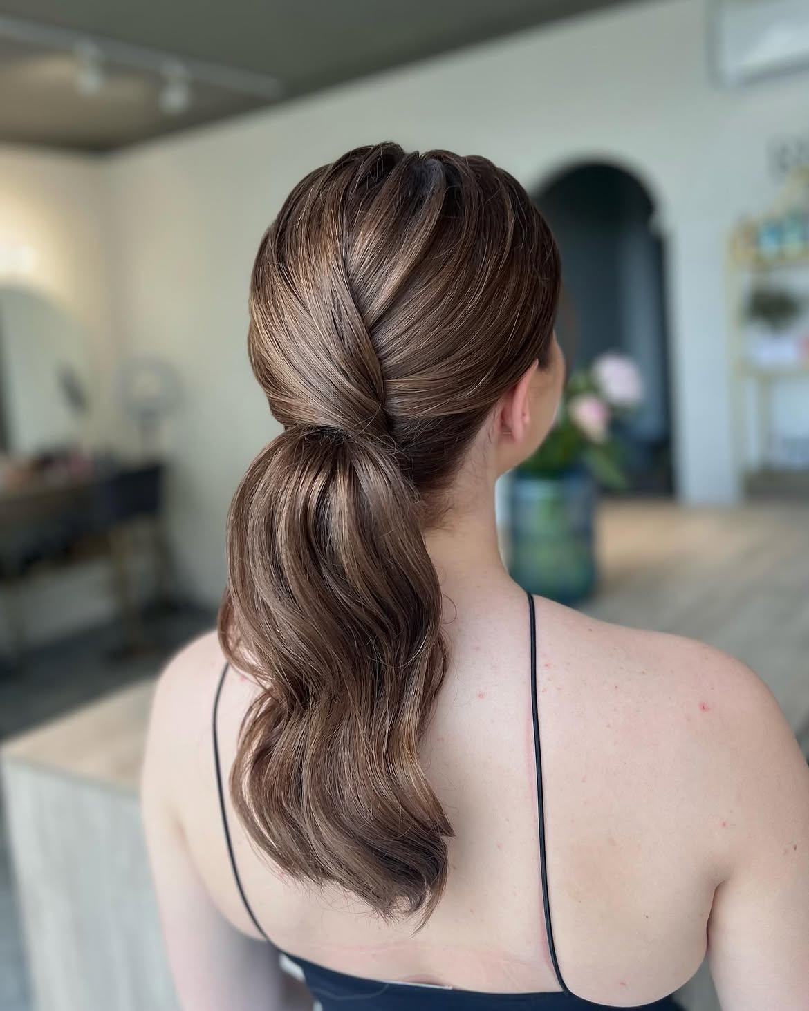 Twisted Crown Low Ponytail With Loose Waves