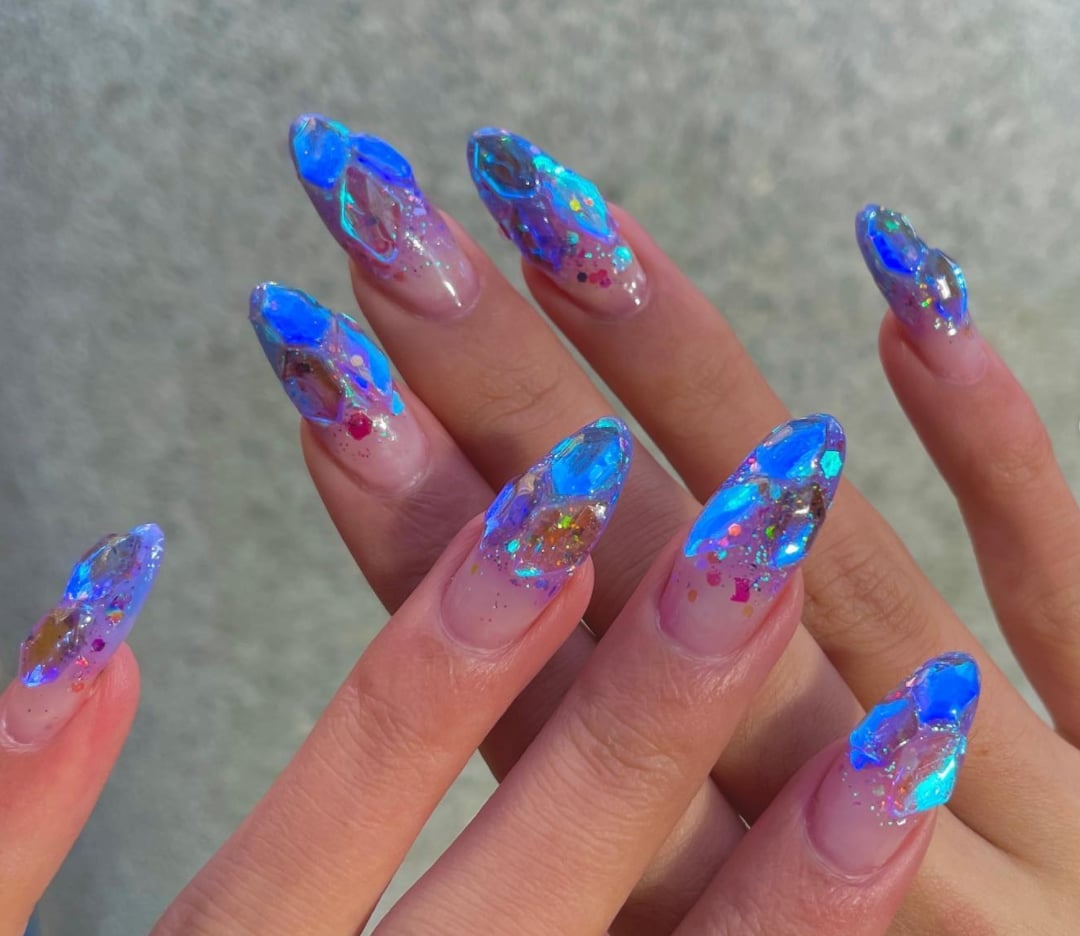 3D Blue Elements Iridescent Glitter Long Almond Nails 3D Blue Elements Iridescent Glitter Long Almond Nails — Unique Nails