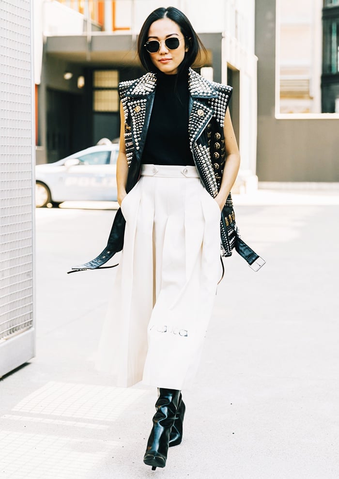 Studded Leather Vest Over Turtleneck and Wide-Leg Pants Studded Leather Vest Over Turtleneck and Wide-Leg Pants — Unique Outfits