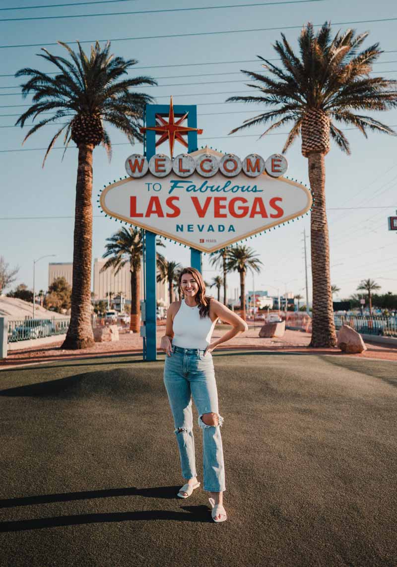 Ripped Light Wash Jeans With White Tank Top Ripped Light Wash Jeans With White Tank Top — Vegas Outfits
