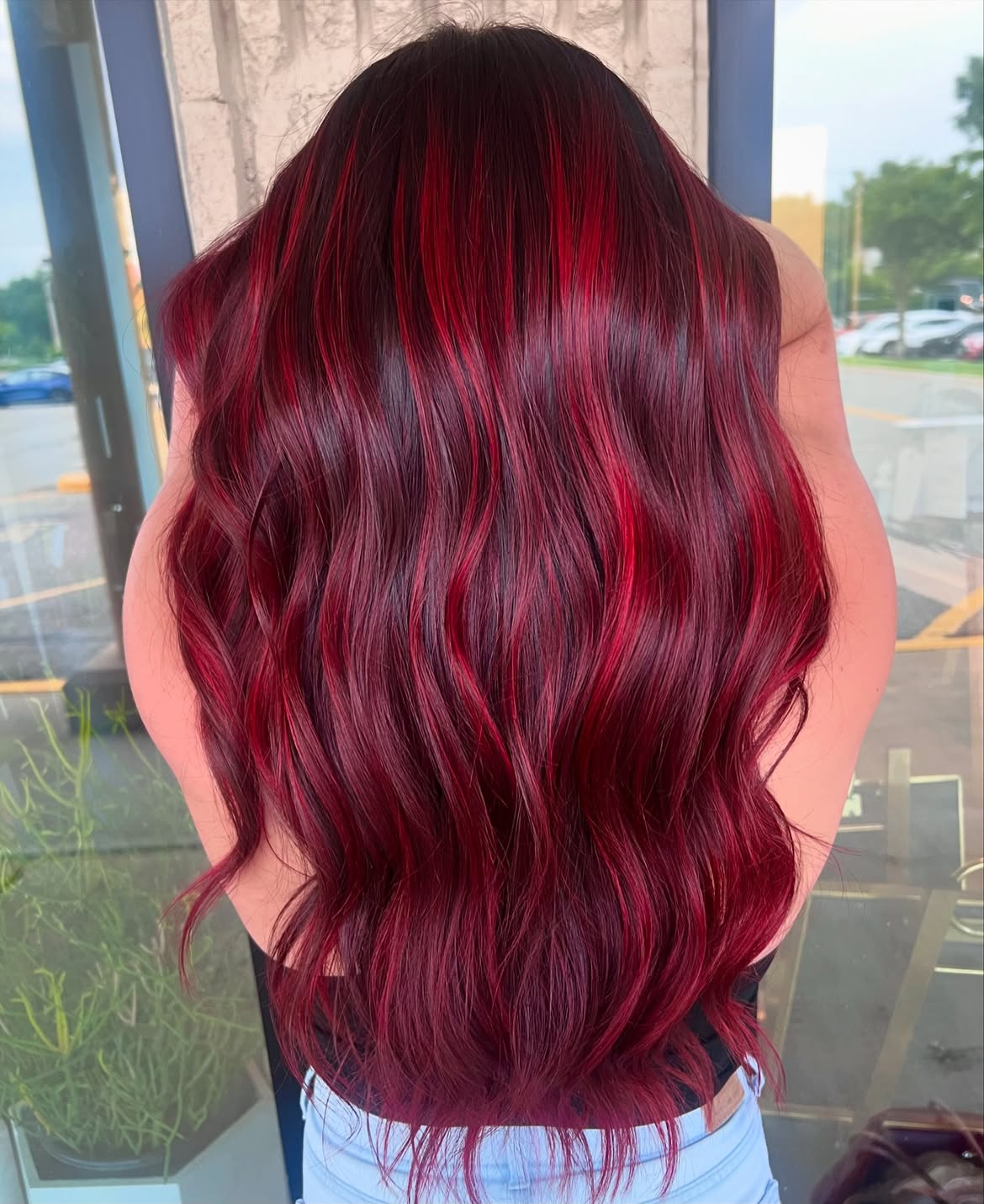 Vibrant Red Highlights On Long Dark Hair