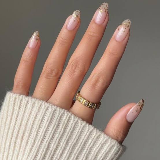 Gold Foil Flakes Medium Almond Nails, Sheer Nude Base Gold Foil Flakes Medium Almond Nails, Sheer Nude Base — Vintage Nails