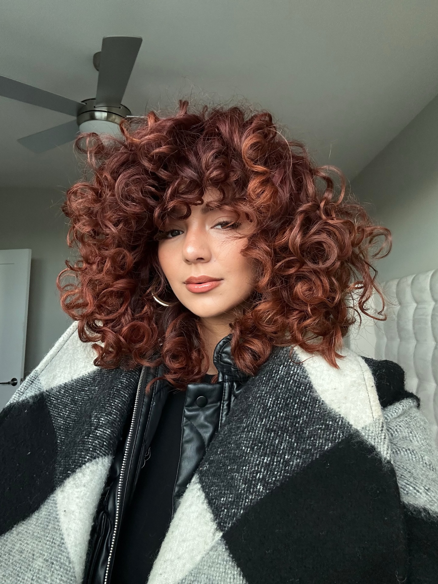 Voluminous Copper Curls With Face Framing