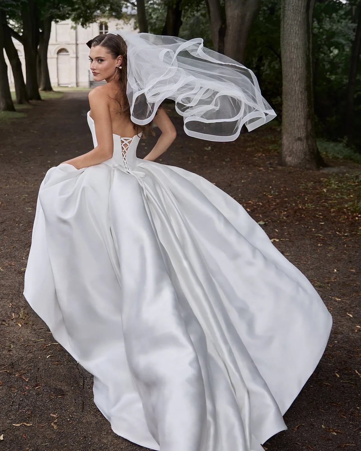 White satin ballgown with dramatic voluminous skirt White satin ballgown with dramatic voluminous skirt — Wedding Dress