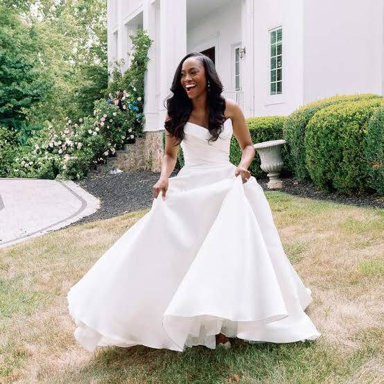 White satin ballgown with full skirt in motion White satin ballgown with full skirt in motion — Wedding Dress