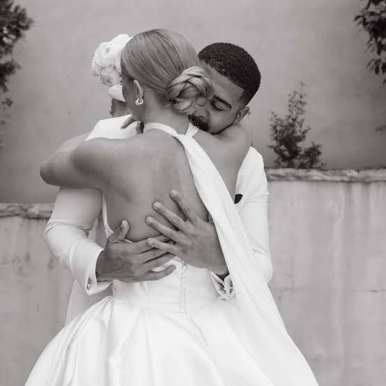 Elegant Low Bun With Loose Tendrils Elegant Low Bun With Loose Tendrils — Wedding Hair