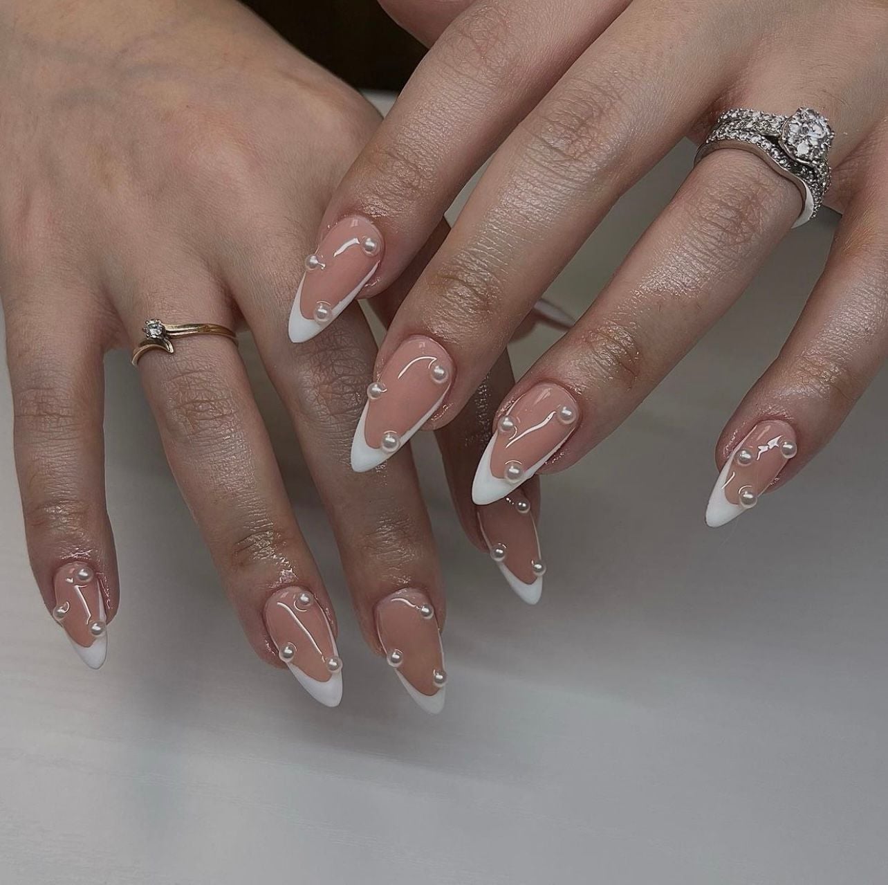Sheer Pink Stiletto Nails with Pearl French Tips Sheer Pink Stiletto Nails with Pearl French Tips — Wedding Nails for Bride