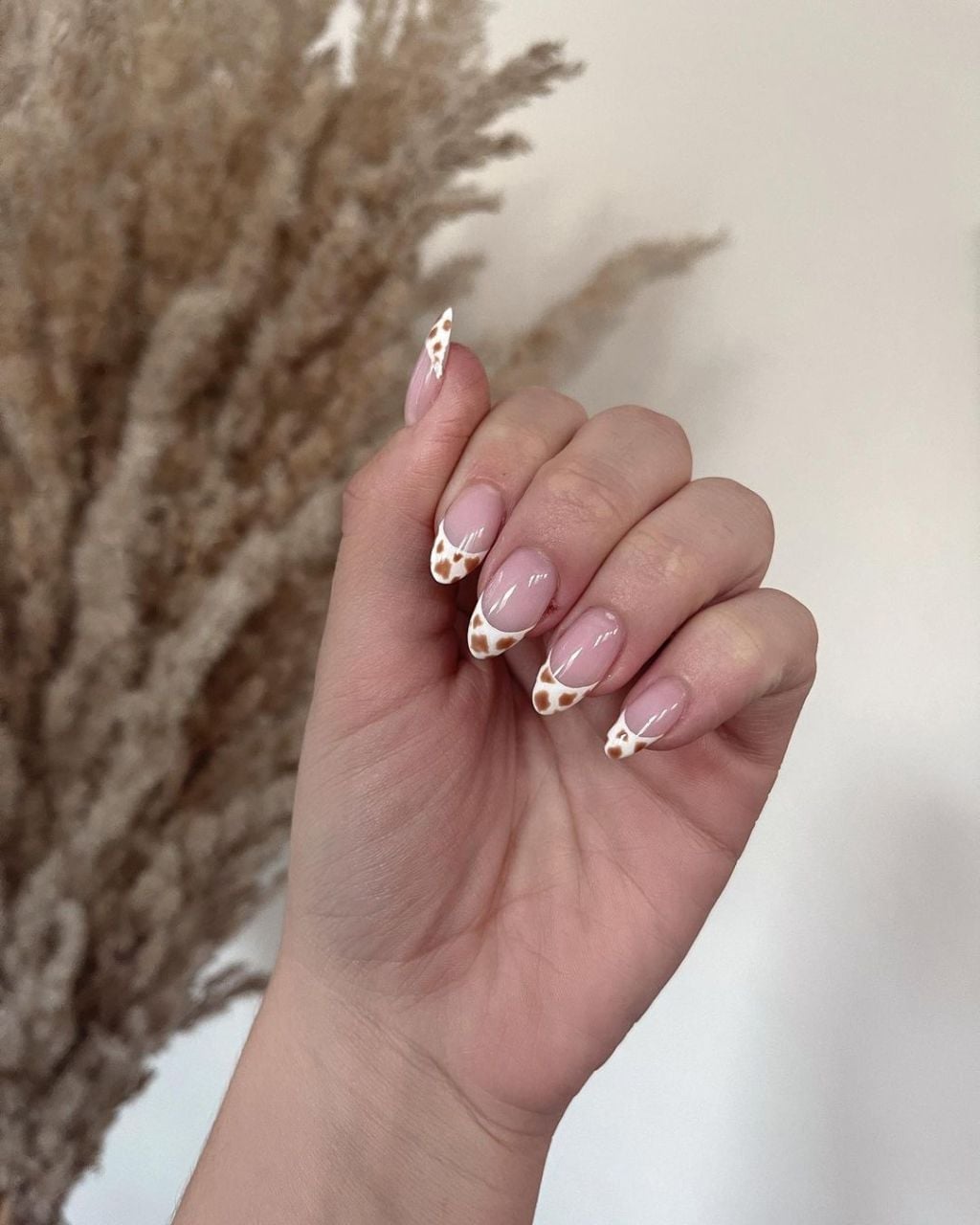 Short Almond Cow Print French Tips, Showcasing The Detailed Artwork Short Almond Cow Print French Tips, Showcasing The Detailed Artwork — Western Nails