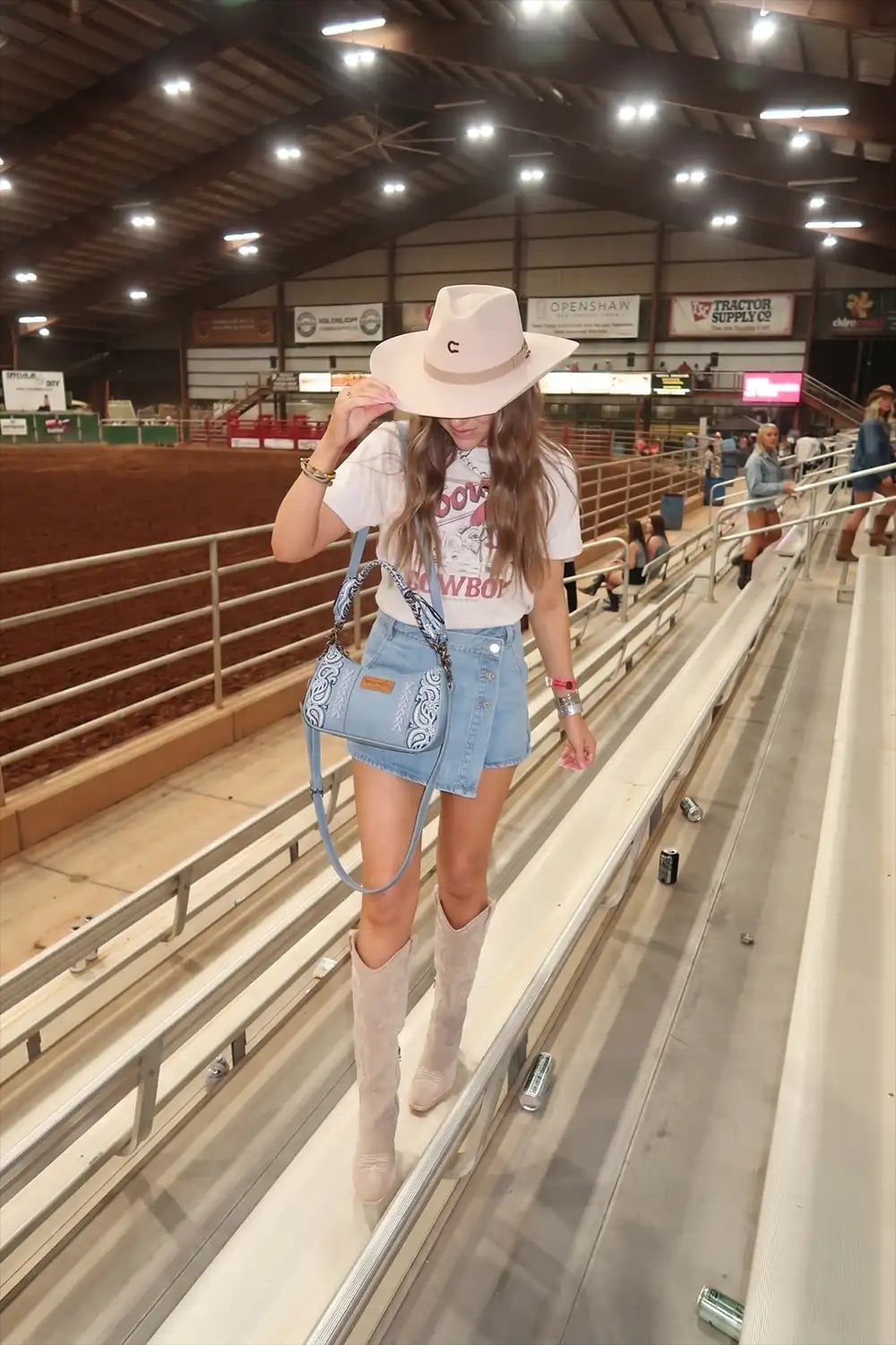 Graphic tee and denim skort with pink cowboy hat Graphic tee and denim skort with pink cowboy hat — Western Outfits