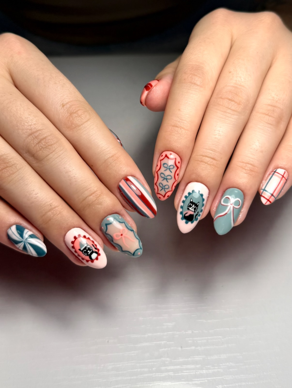 Whimsical Christmas Cat & Bow Oval Nails