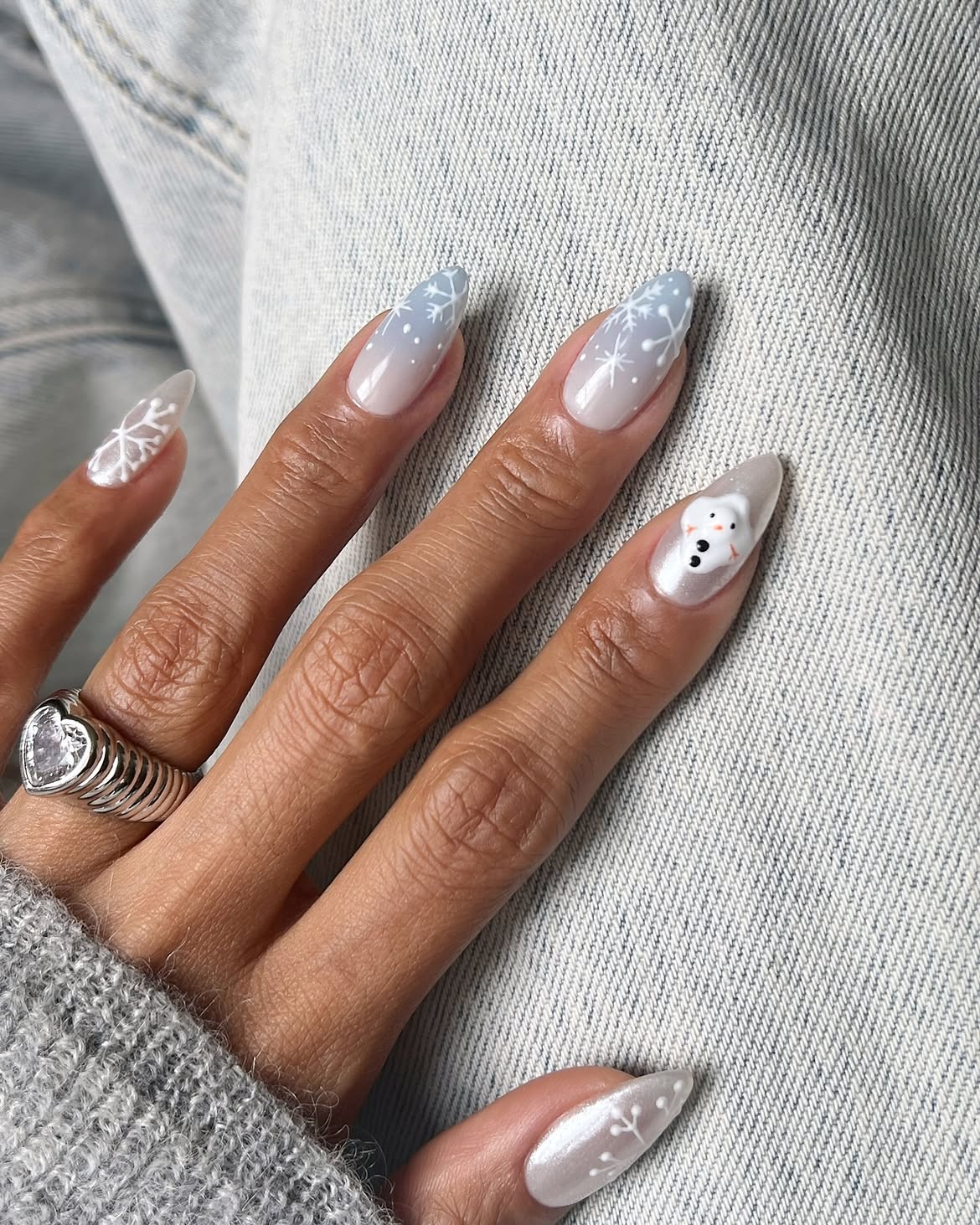 Whimsical Snowman and Snowflake Almond Nails