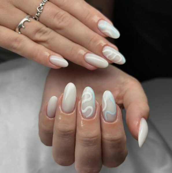 Milky White Swirl Art Medium Almond Nails Milky White Swirl Art Medium Almond Nails — White Acrylic Nails