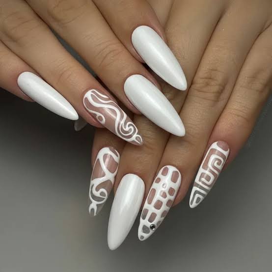 Pearlescent White Stiletto Nails with Swirl Art Pearlescent White Stiletto Nails with Swirl Art — White Acrylic Nails