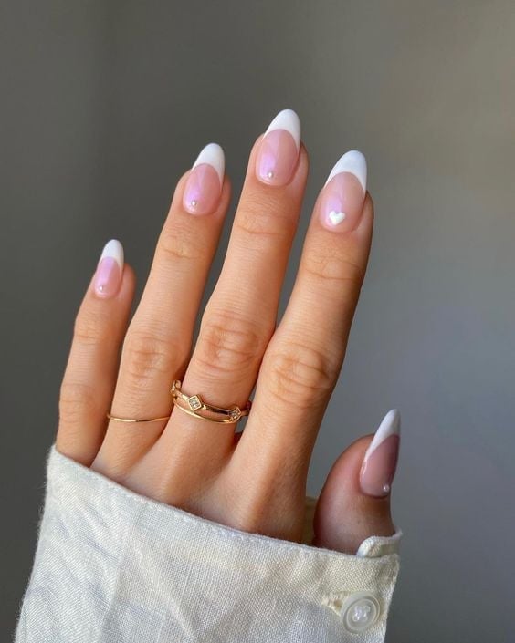 Sheer Nude French Tip Medium Almond Nails with Pearl Sheer Nude French Tip Medium Almond Nails with Pearl — White Acrylic Nails