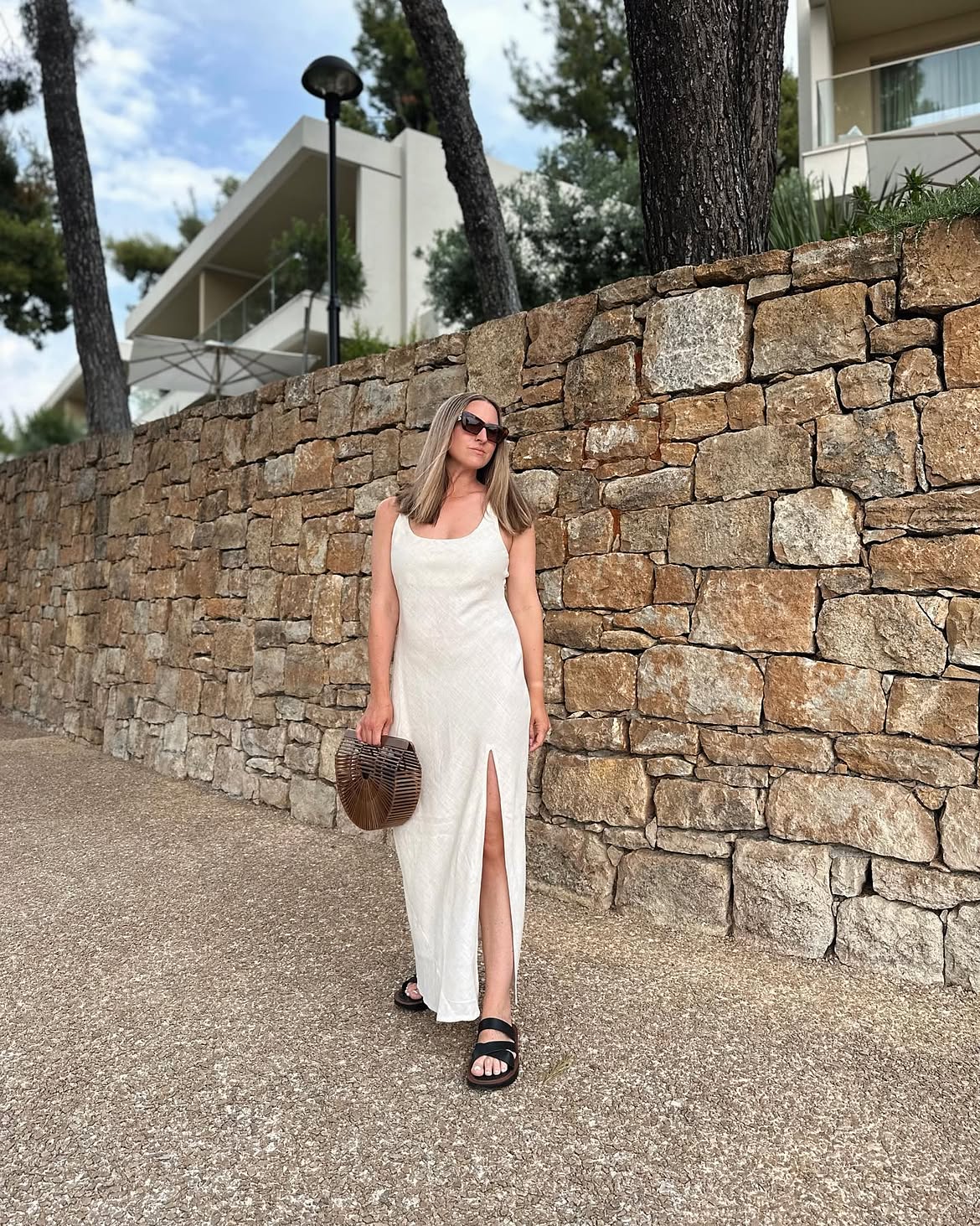 White Linen Maxi Dress With Wooden Clutch Vacation Look