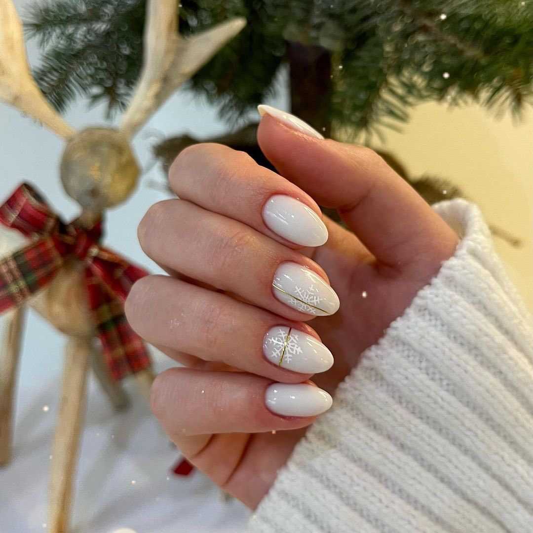 White Snowflake Almond Christmas Nails