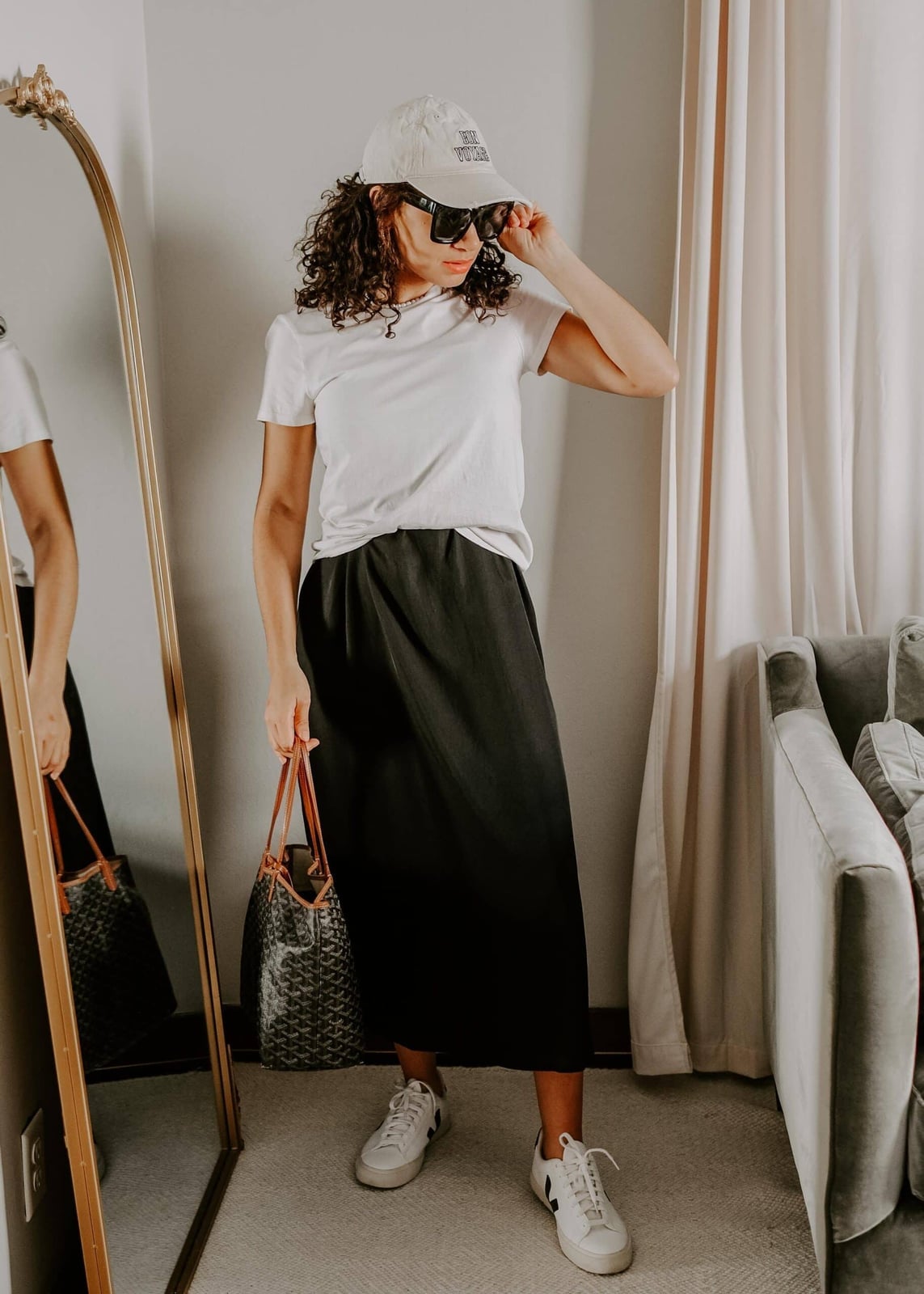 White T Shirt Tucked Into Long Black Skirt White T Shirt Tucked Into Long Black Skirt — White Top Outfits