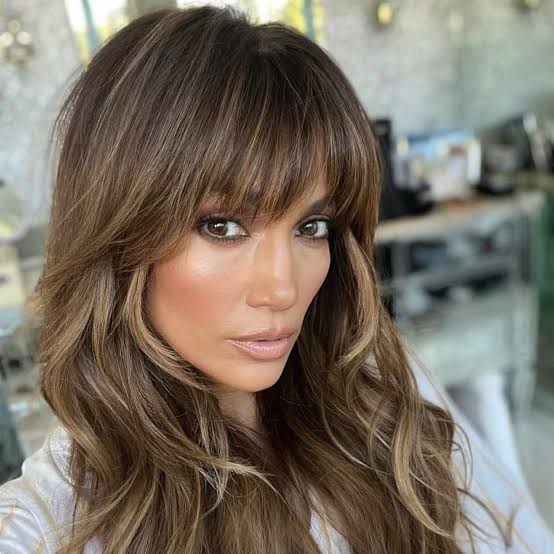 Brown Mid-Back Wolf Cut With Long Bangs Brown Mid-Back Wolf Cut With Long Bangs
