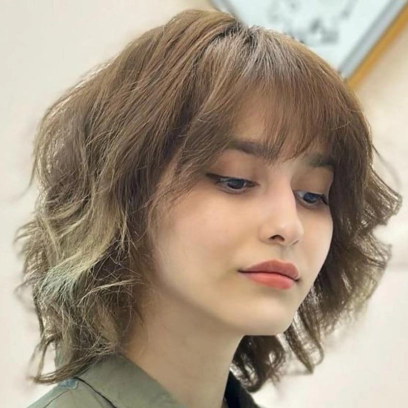 Chin Length Wolf Cut With Short Choppy Bangs Chin Length Wolf Cut With Short Choppy Bangs — Wolf Cut Hair