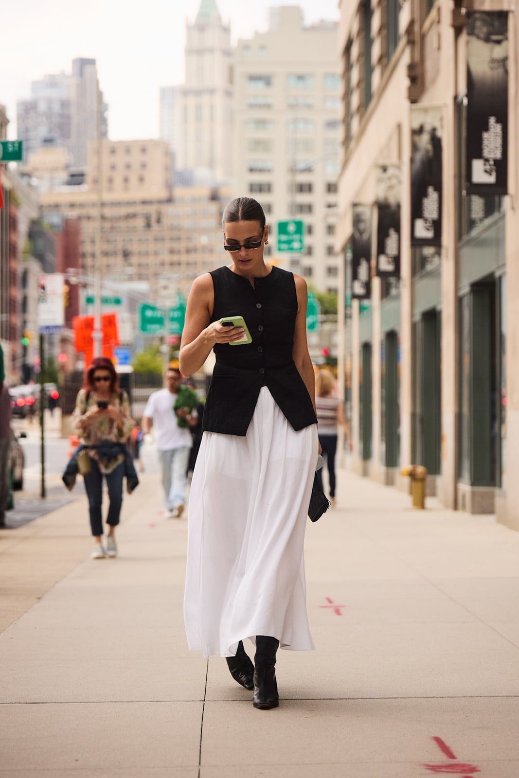 Black Sleeveless Vest Over White Maxi Skirt Black Sleeveless Vest Over White Maxi Skirt — Work Outfits