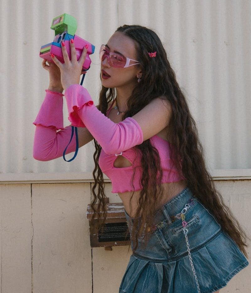 Hot pink ruffled crop top and denim mini skirt Hot pink ruffled crop top and denim mini skirt — Y2K Style